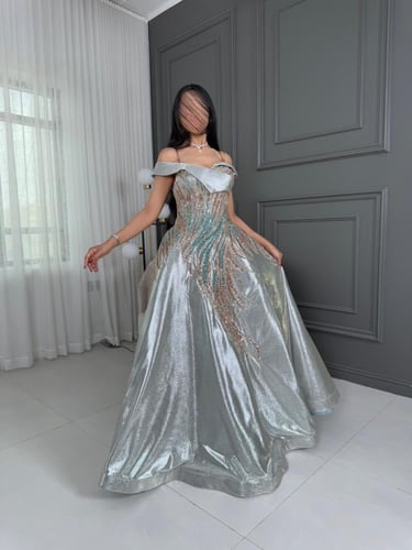 فستان سهرة كلوش بتطريز فصوص قصه توب