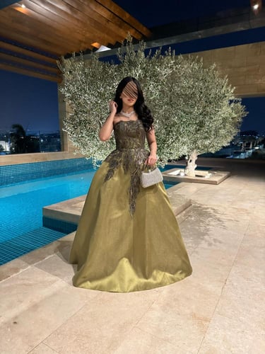 فستان سهرة زيتي فاخر بتصميم كلوش