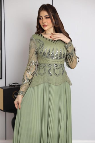 فستان ناعم نسائي باللون التفاحي بتطريز هندسي وتنور...