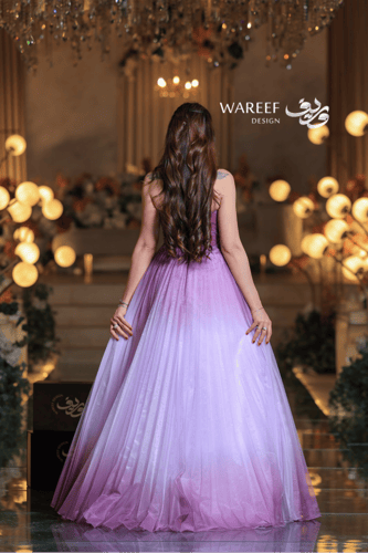 فستان سهرة أرجواني متدرج بتصميم ملكي وتطريز فاخر ب...