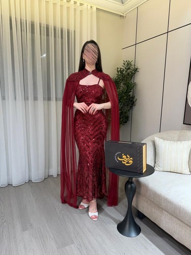 فستان سهرة عنّابي مطرّز مع كاب شيفون فاخر