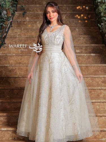 فستان سهرة بيج بأكمام طويلة وتطريز كمبيوتر – تصميم...