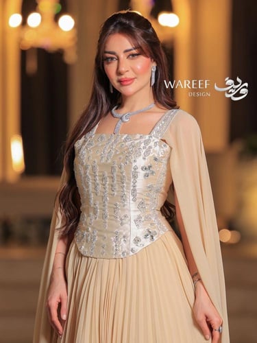 فستان سهرة بكورسيه واكمام طويله