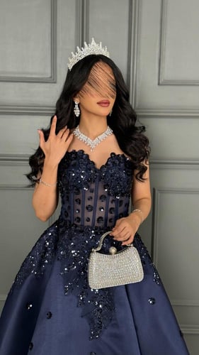 فستان كحلي ملكي مطرز بورود من الترتر