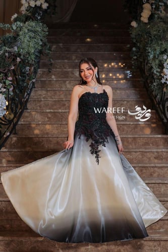 فستان سهرة أسود وبيج بتطريز أحمر – تدرجات أنيقة ون...