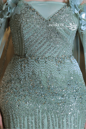 فستان سهرة طويل أخضر شيفون وتول فاخر بتطريز كريستا...