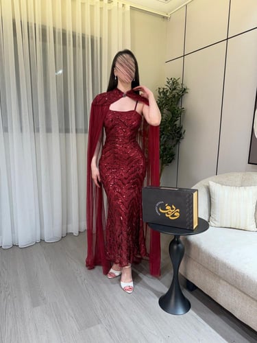 فستان سهرة عنّابي مطرّز مع كاب شيفون فاخر
