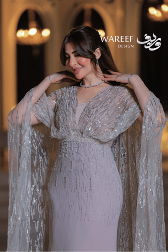 فستان سهرة لحمي طويل كاب شفاف مطرز بالفضة قصة حوري...