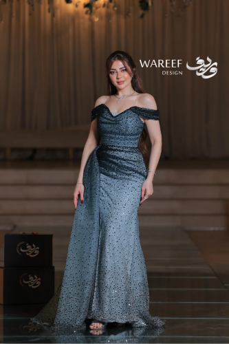 فستان سهرة أزرق سماوي طويل قما شبكي ومطرز بترتر أس...