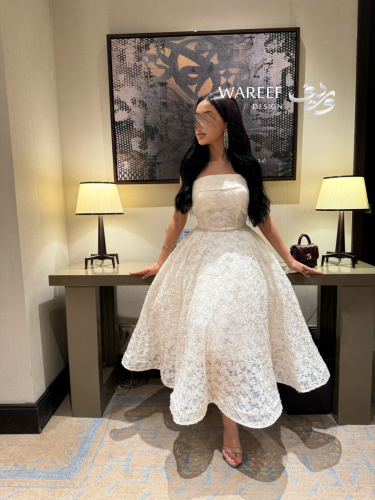 فستان سهرة ميدي من الدانتيل الفاخر بتصميم أنثوي كل...