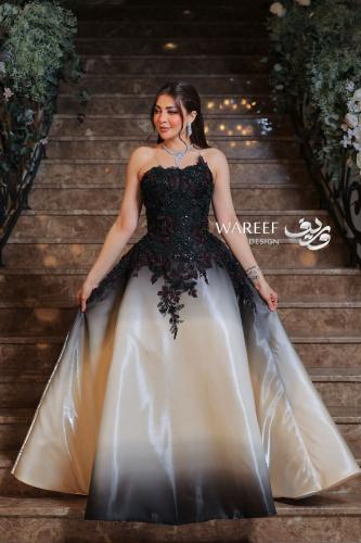 فستان سهرة أسود وبيج بتطريز أحمر – تدرجات أنيقة ون...