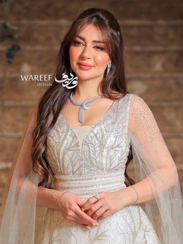 فستان سهرة بيج بأكمام طويلة وتطريز كمبيوتر – تصميم...