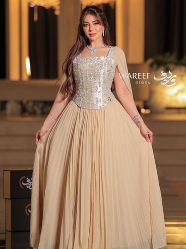 فستان سهرة بكورسيه واكمام طويله