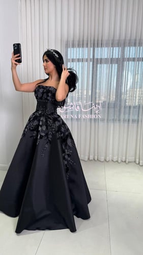فستان سهرة اسود مزين بتطريز انيق