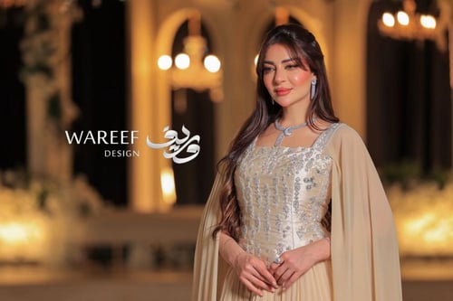 فستان سهرة بكورسيه واكمام طويله