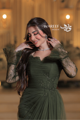 فستان سهرة أخضر زيتوني بقصة أوف شولدر وتنورة تول ا...