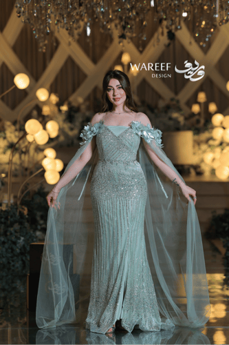 فستان سهرة طويل أخضر شيفون وتول فاخر بتطريز كريستا...