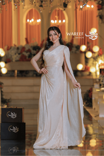 فستان سهرة بيج مزخرف بحزام لؤلؤي