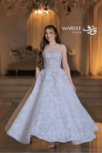 فستان سكري اسهرة منفوش مطرز بتفاصيل زهرية رقيقة وح...