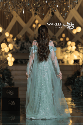 فستان سهرة طويل أخضر شيفون وتول فاخر بتطريز كريستا...