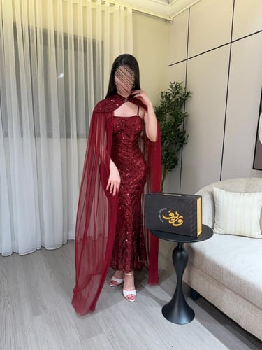 فستان سهرة عنّابي مطرّز مع كاب شيفون فاخر