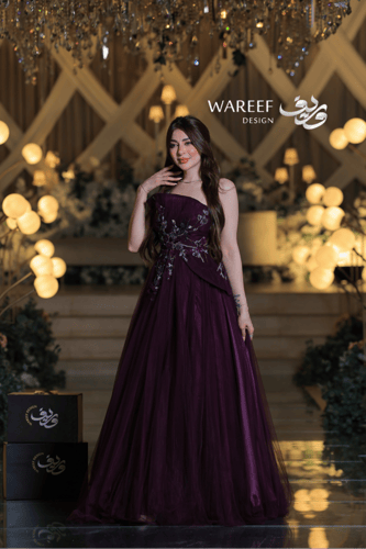 فستان سهرة ملكي بتفاصيل تطريز فاخر وقماش تول أنيق