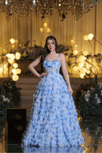 فستان سهرة أزرق سماوي بطبقات تول مزخرفة وقصة كورسي...
