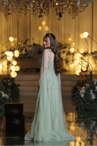 فستان سهرة أخضر فستقي مطرز مع كاب شفاف فاخر