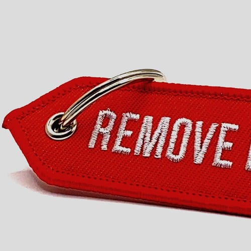 remove before flight - احمر
