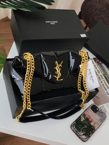 شنطة سان لوران السوداء فخامة لامعة بتفاصيل ذهبية ج...