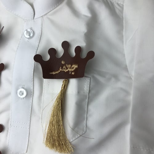 بروش التاج جلد