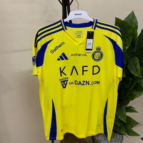 تيشيرت نادي النصر الاساسي الجديد 2025 الاصفر