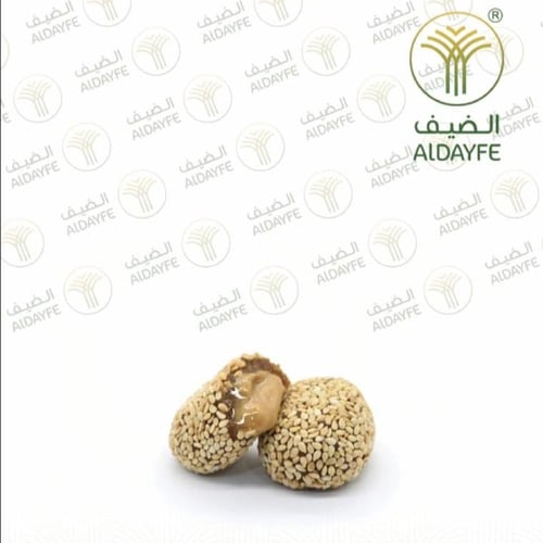 كرتون تمرية محشوة بالطحينة ومغطاه بالسمسم 1 كيلو