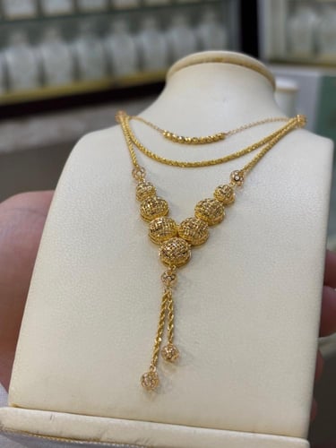 سبحة وعقد دورين ذهب صافي عيار 21