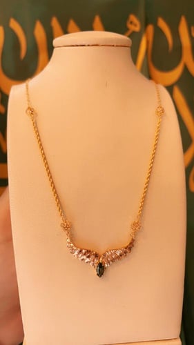 عقد الجناح ذهب صافي عيار 21