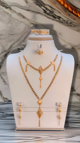 طقم كرسي جميل وانيق ذهب صافي عيار 21