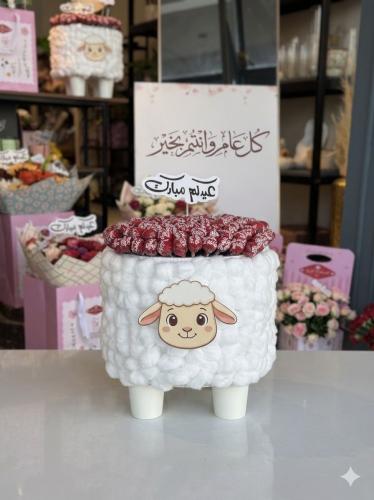 خروف الحجم الوسط مع حلاوة مصاص