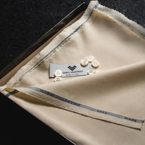 قماش ماريو فالنتينو الإيطالي كريمي غامق