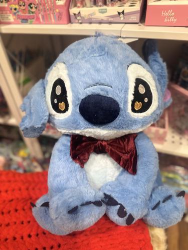 دمية ستيتش مع بطانية