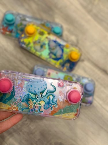 توزيعات العيد للاطفال ( سيفين كيو العاب مائية)