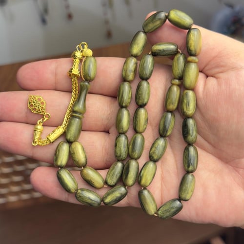 مسباح اخضر و بتعريق و تنجيم