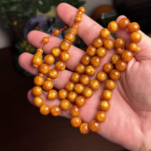 مسباح ذهبي مع تنجيم