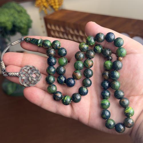 فاتوران أخضر بتعريق أحمر طربزونه عيار ألف