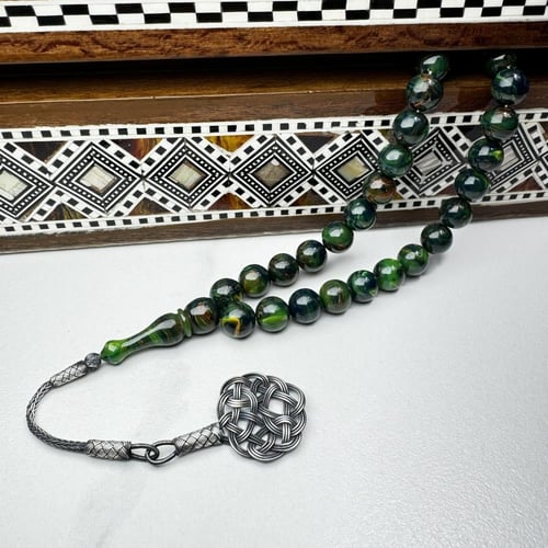 فاتوران أخضر بتعريق أحمر طربزونه عيار ألف