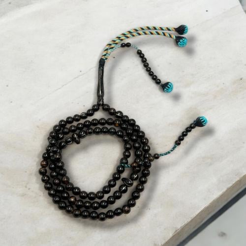 سبحه يسر ٩٩ خرزة بفواصل فضه بعدادات