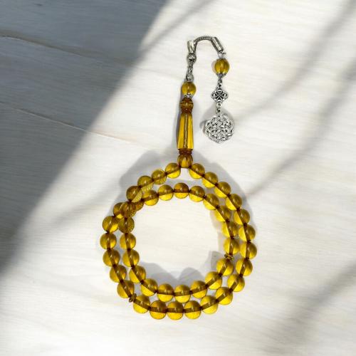 مسباح بكلايت اصفر شفاف