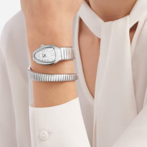 ساعة نسائية لفة ثعبان فضي مينا فضي M10066