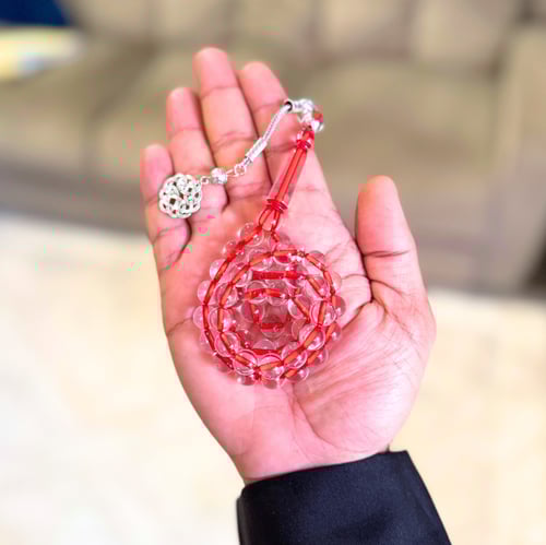 سبحة من بكلايت باللون الاحمر الشفاف