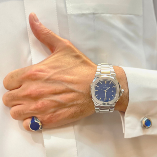 ساعة رجالية مميزة - ماركة ( VLAMOUR )