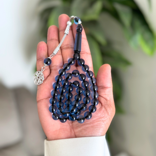 سبحة من بكلايت باللون الازرق الشفاف